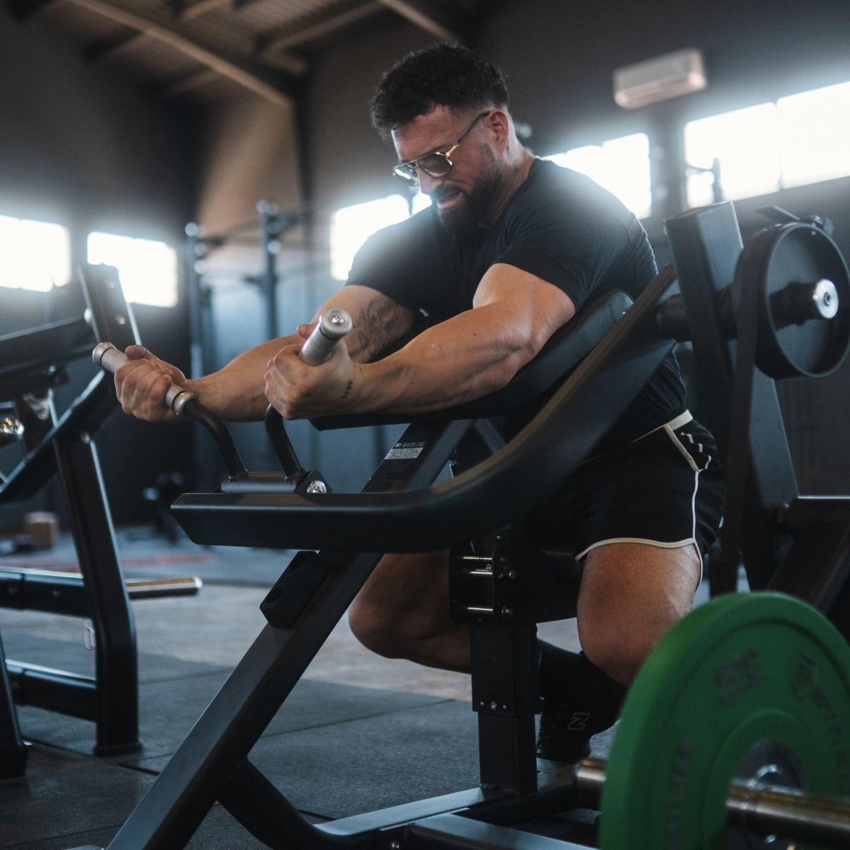 Biceps Curl avec Charge de Disques
